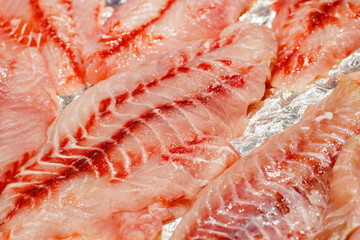 Fish fillet red raw, chilled on market, selective focus