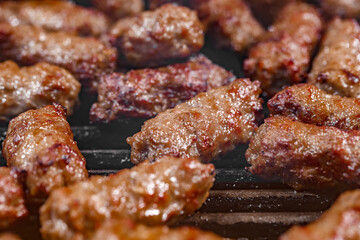 Meat cutlets lula kebab fried on grill, selective focus