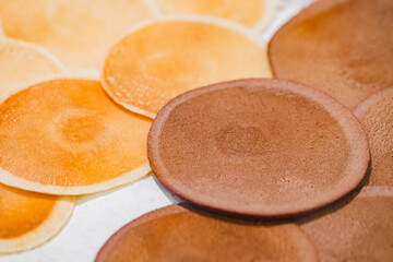 Pancakes light and chocolate in bulk, on supermarket, selective focus