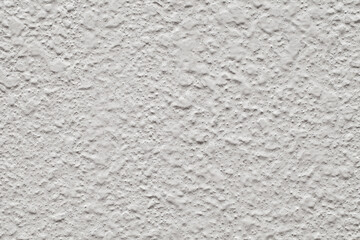 Background, rough white painted uneven wall, uniform texture