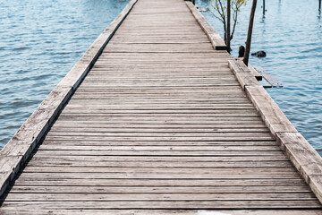 Fototapeta premium wooden footbridge over the water