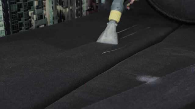 Home cleaning company for upholstered furniture. Removal of dirty stains and stains from furniture upholstery. Washing vacuum cleaner. Copy space for text