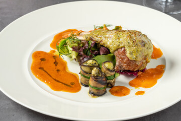 Lamb chops with various vegetables in a fine dining restaurant
