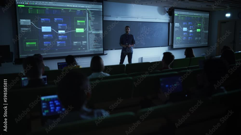 Fototapete young male lecturer giving a web development masterclass to diverse multiethnic group of female and 
