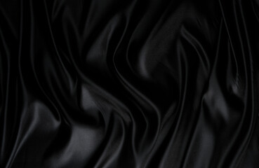 Silk fabric, abstract wavy black satin fabric background.
