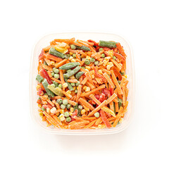 Set of frozen cut vegetables in square plastic bowl for keeping on white. Top view. Square format.