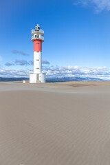 Faro del Fangar (Fangar Lighthouse) in Punta del Fangar, Spain