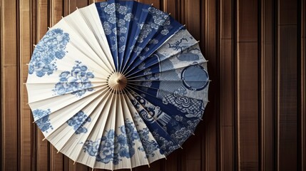 A blue and white Chinese paper umbrella hanging on a wooden wall. Generative AI