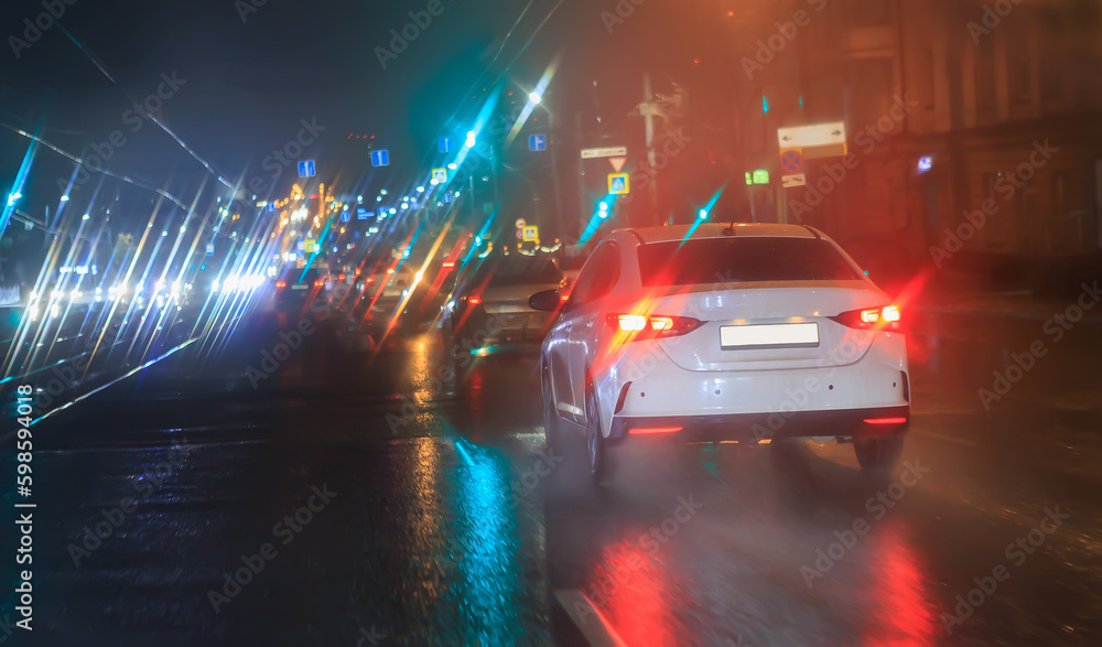 Canvas Prints Car traffic at night in the rain on a city