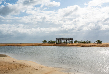 Base of house raised on stilts damaged by hurricane