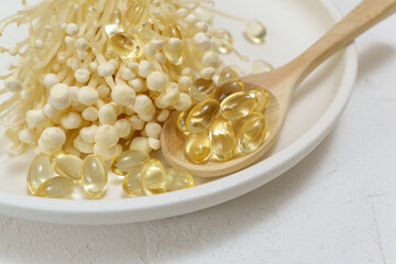 Mushroom or enoki medical use, dietary supplements, pills capsules. Golden needle mushroom.