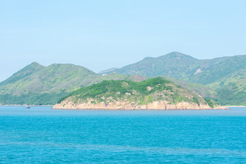 Panorama of Chinese sea coast near Hong Kong. View from the sea side.