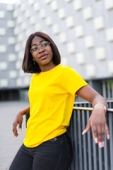 Effortless Elegance: A Stylish Black Woman Wears Yellow with Grace and Confidence