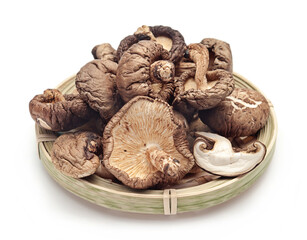 Fototapeta premium Dried Shiitake Mushrooms on White Background