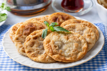 Delicious meat pie from Turkish cuisine. Fried handmade pies. Turkish name; fincan boregi or puf borek