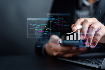 Analyst working with computer in Business Analytics and Data Management System to make report with KPI and metrics connected to database. Corporate strategy for finance, operations