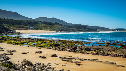 Porto do Son, Galicia, Spain - April 6, 2023: Beach in Castro de Baroña