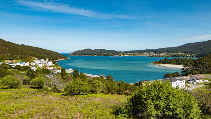 Fototapeta na wymiar Porto do Barqueiro, Galicia, Spain - April 2, 2023: General view of the bay