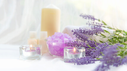 Obraz na płótnie Canvas Spa beauty massage health wellness background.  Spa Thai therapy treatment aromatherapy for body woman with lavender flower nature candle for relax and summer time. Copy space and banner