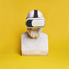 Antique statue bust wearing VR glasses against yellow background. Online video games, simulator,...