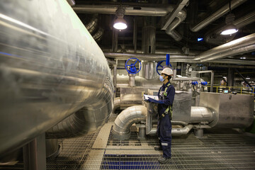 Male to be worker visual inspection inside control room valve tank pipeline