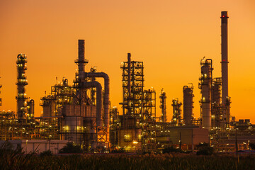 Fototapeta na wymiar Oil​ refinery​ and​ plant and tower column of Petrochemistry industry in oil​ and​ gas​ ​industrial with​ cloud​ orange​ ​sky