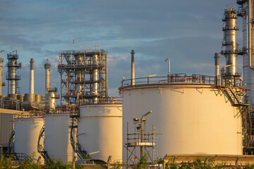 Twilight scene of tank oil refinery plant and tower column of Petrochemistry industry