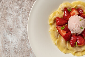 Vareniki with cottage cheese and strawberries
