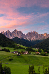 Fototapeta na wymiar panorama view of the dolomites in val di funes, the Odle with the village of Santa Maddalena below, Italy