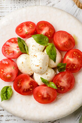 tomatoes with mozzarella and basil