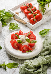 tomatoes with mozzarella and basil
