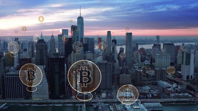 Aerial View of Manhattan with Bitcoin Logos. Animation of Cryptocurrency Icons Over The City. Augmented Reality in New York. United States.