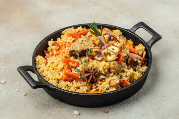 plate of pilaf. traditional Uzbek dish. rice with vegetables. banner, menu, recipe place for text, top view