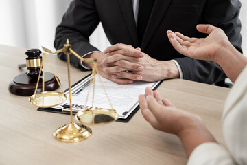 Lawyer are advising with client about legal litigation.