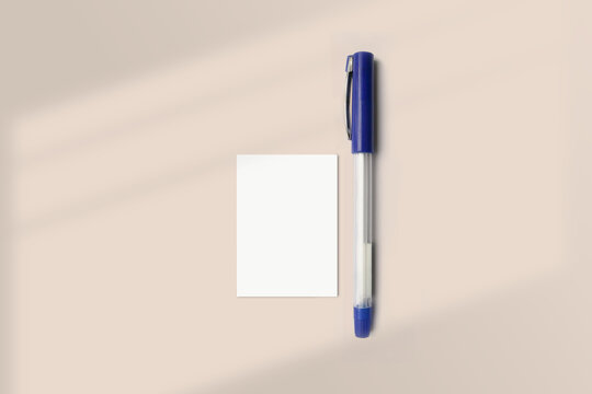 Realistic A8 paper flatlay mockup with a pen. Portrait A8 International Paper Size mockup top view. Simple, clean, modern, minimal super small paper mock up flat lay concept