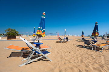 beach chairs and umbrellas on the beach