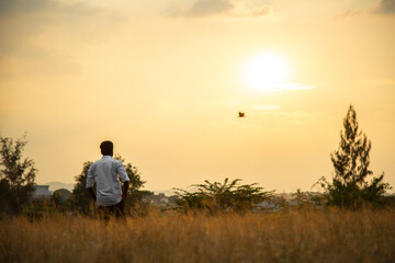 single on the beach at sunset