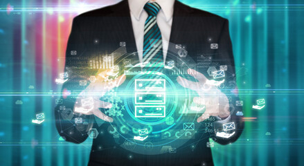 Businessman holding technology icon concept