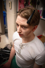 Young male actor in makeup 