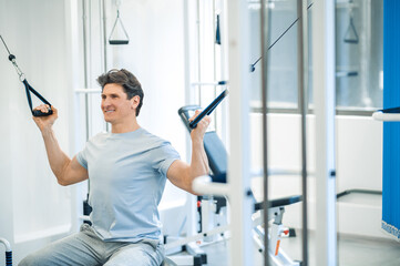 Man having a workout on hyperextension