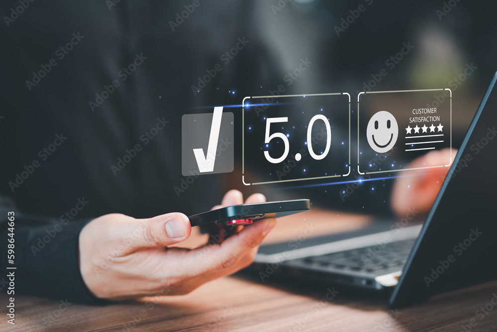 Poster man hand using a mobile phone with virtual screen on happy smile face icon to give satisfaction in s