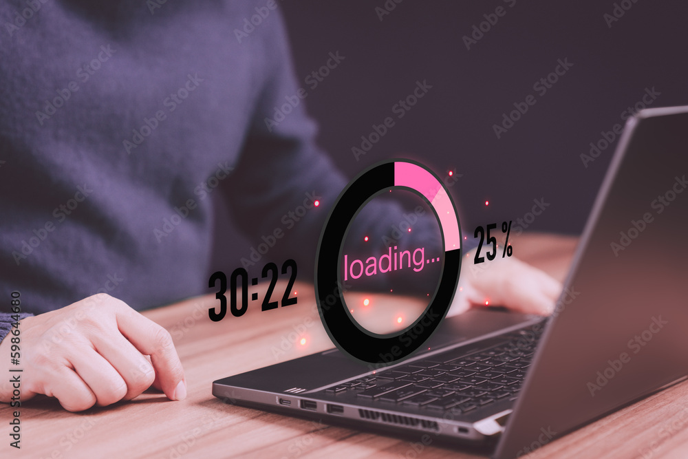 Poster Young man using a laptop computer for download software and waiting to loading digital business data form website, very slow internet form wifi. Concept of waiting for load of loading symbol.