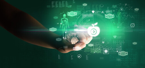Doctor hand pressing futuristic health device with medical symbol on screen