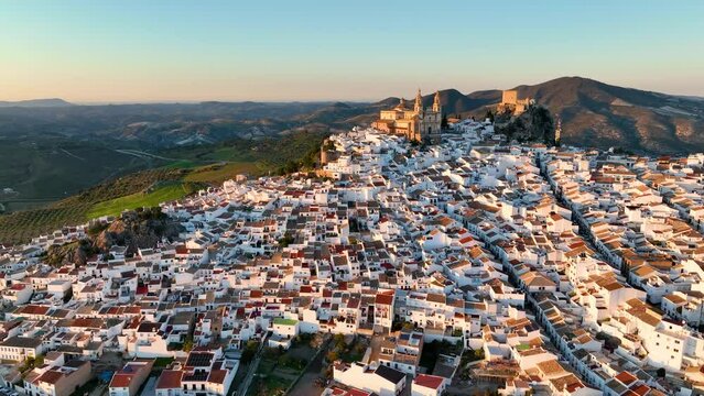 aerial view of Castillo de Olvera Towering On White Village In Olvera, Province of Cadiz, Spain