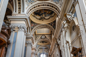 Interior architecture of the cathedral basilica of Zaragoza with paintings on ceilings and walls,...