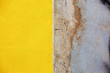 Yellow gray concrete wall. Natural surface texture with space for text