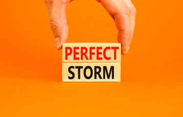 Perfect storm symbol. Concept words Perfect storm on beautiful wooden block. Beautiful orange table...