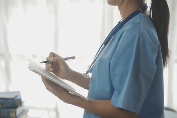 Male Doctor writing out RX prescription, copy space, consent contract sign prescribe a remedy...