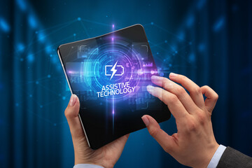 Businessman holding a foldable smartphone, technology concept