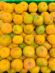yellow orange sell at supermarket. Look delicious, sweet and satisfying. Field of view. Close up photography food